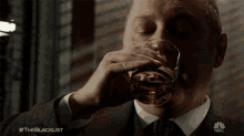 Drinking James Spader GIF - Drinking James Spader Raymond Reddington GIFs