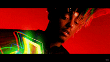 a colorful background with the word vevo on the bottom left