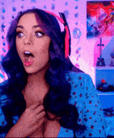 a woman with a surprised look on her face