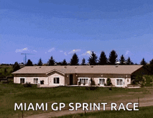 a house with the words miami gp sprint race written above it