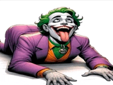 a joker laying on the floor with his tongue hanging out
