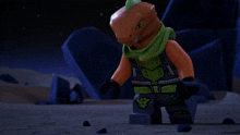 a lego figure is kneeling down with a glowing light in his hands