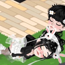 a boy and a girl laying on the grass with bunny ears on their heads