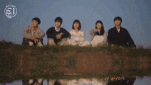 a group of people standing next to each other with the year 2017-2015 visible
