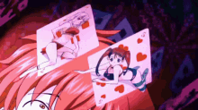 a couple of playing cards one of which is a s