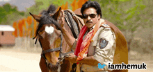 a man in a police uniform is standing next to a horse with the hashtag iamhemuk