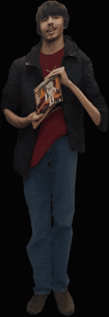 a man wearing a red shirt and a black jacket is holding a bag of cereal with a cartoon character on it