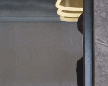 a man in a suit and tie is peeking out from behind a doorway