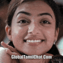 a close up of a woman 's face with the website globaltamilchat.com written below her