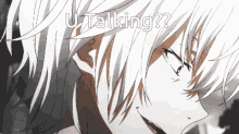 a close up of a person 's face with the words " u talking " on the bottom