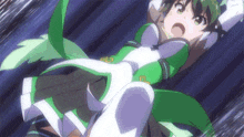 a girl in a green and white outfit is being kicked in the face