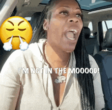 a woman in a car says i 'm not in the mood !