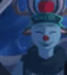 a close up of a reindeer wearing a green hat with an apple on top .