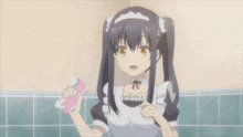 a girl in a maid costume is holding a pink object
