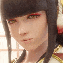 a close up of a woman 's face with a red eyeshadow