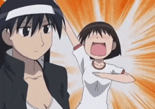a man and a woman are standing next to each other and the woman is screaming