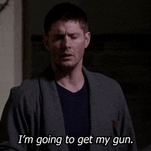 a man in a gray robe says i 'm going to get my gun