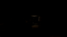 a dark hallway with a sign that says rod on the wall