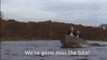 a man in a tuxedo is in a boat on a lake and the caption says we 're gonna miss the bite