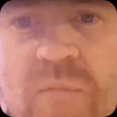 a man with tears running down his face