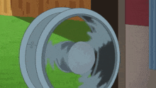 a cartoon of a boy standing in front of a circular object with the letter o on it