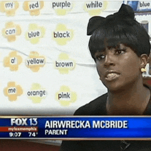 airwrecka mcbride is a parent of a child with a bow in her hair