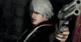 a man in a red coat is holding a large gun