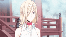 a blonde anime girl with a red scarf around her neck is looking at the camera