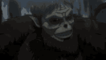 a close up of a monster with a beard and a skull on his face