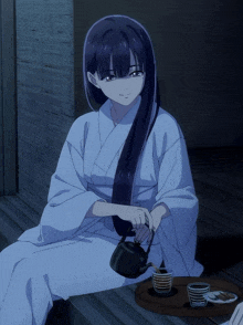 a girl in a white kimono is sitting on a wooden bench