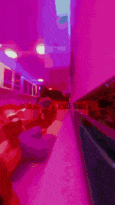 a blurred image of a kitchen with a purple ceiling