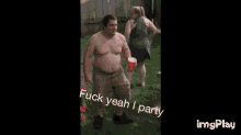 a shirtless man is dancing with a red cup in his hand and says fuck yeah i party ..
