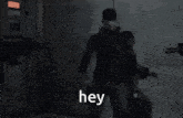 a group of soldiers are standing next to each other in a dark room with the words `` hey '' in the foreground .