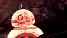 a close up of a robot with the number 8 on its head