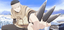 a man with a bandage on his head is holding a pair of knives in his hand