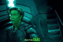 a man with a green face says " don 't be as teal "