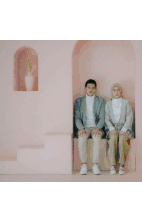 a man and woman are posing for a picture with the words nynd photography on the bottom left