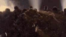 a group of soldiers are fighting each other in a battle .
