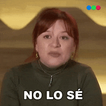 a woman with red hair says no lo se in spanish