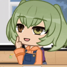 a cartoon girl with green hair is sitting at a desk
