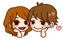 a boy and a girl are hugging each other and smiling with a heart between them .