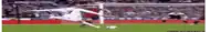 a soccer player with the number 7 on his jersey is kicking a soccer ball .
