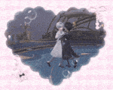 a couple dancing in a heart shaped frame with bubbles