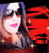 a woman wearing sunglasses and pink lipstick looks at the camera
