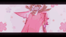 a girl with pink hair and a pink cape is standing in front of pink flowers .