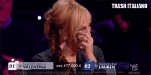 a woman is on a tv screen with the words trash italiano on the bottom