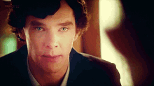 a close up of a man 's face with bbc one written on the bottom right