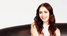 Lilly Collins GIF - Lilly Collins Smile GIFs