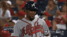 a baseball player for the atlanta braves looks down
