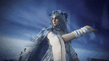 a woman in a white dress with feathers on her hair